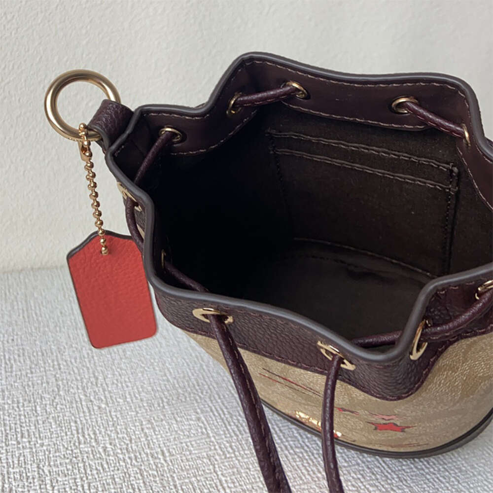 Handbag Designer 50% Discus sur les sacs féminines de marque chaude nouvelle cordon de cordon un sac de seau d'épaule