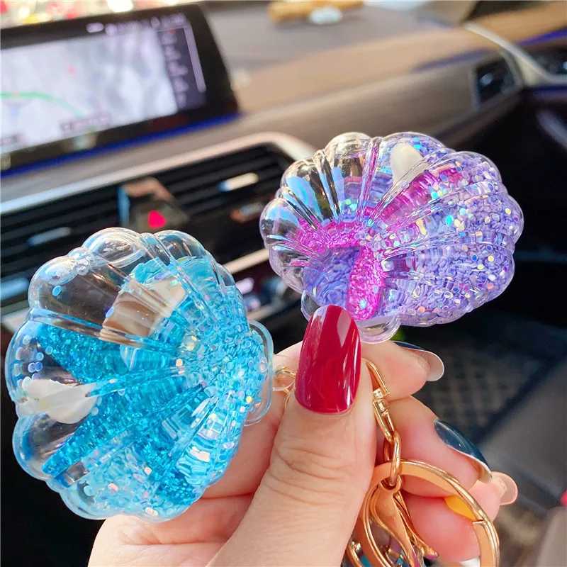 Keychains lanyards Creative Acryl Liquid Oil Starfish Söt flytande nyckelringstrand varelse Skal Keyring Women Bag Pendant Trinket Aquarium Gift