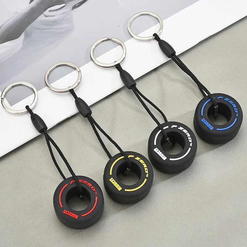 Keychains Lanyards Luxury Mini F1 Racing Tire Keychain Car Key Accessories PVC Tyre Pendant Bag Charm Mens Gadgets Gifts For Friends Car Lovers