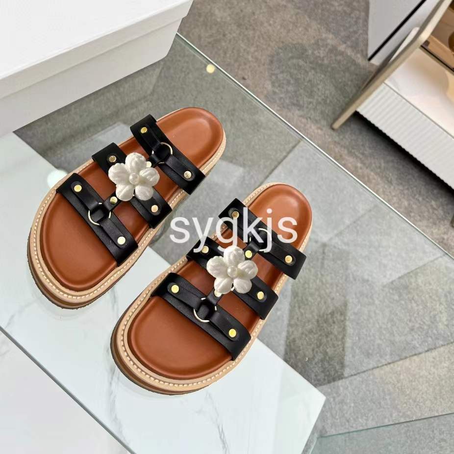 Luksusowa moda Tan Black Tippi Sandals Sandals Calfskin Designer Buty damskie płaskie obcasy w stylu swobodny rozmiar 35 do 41 42