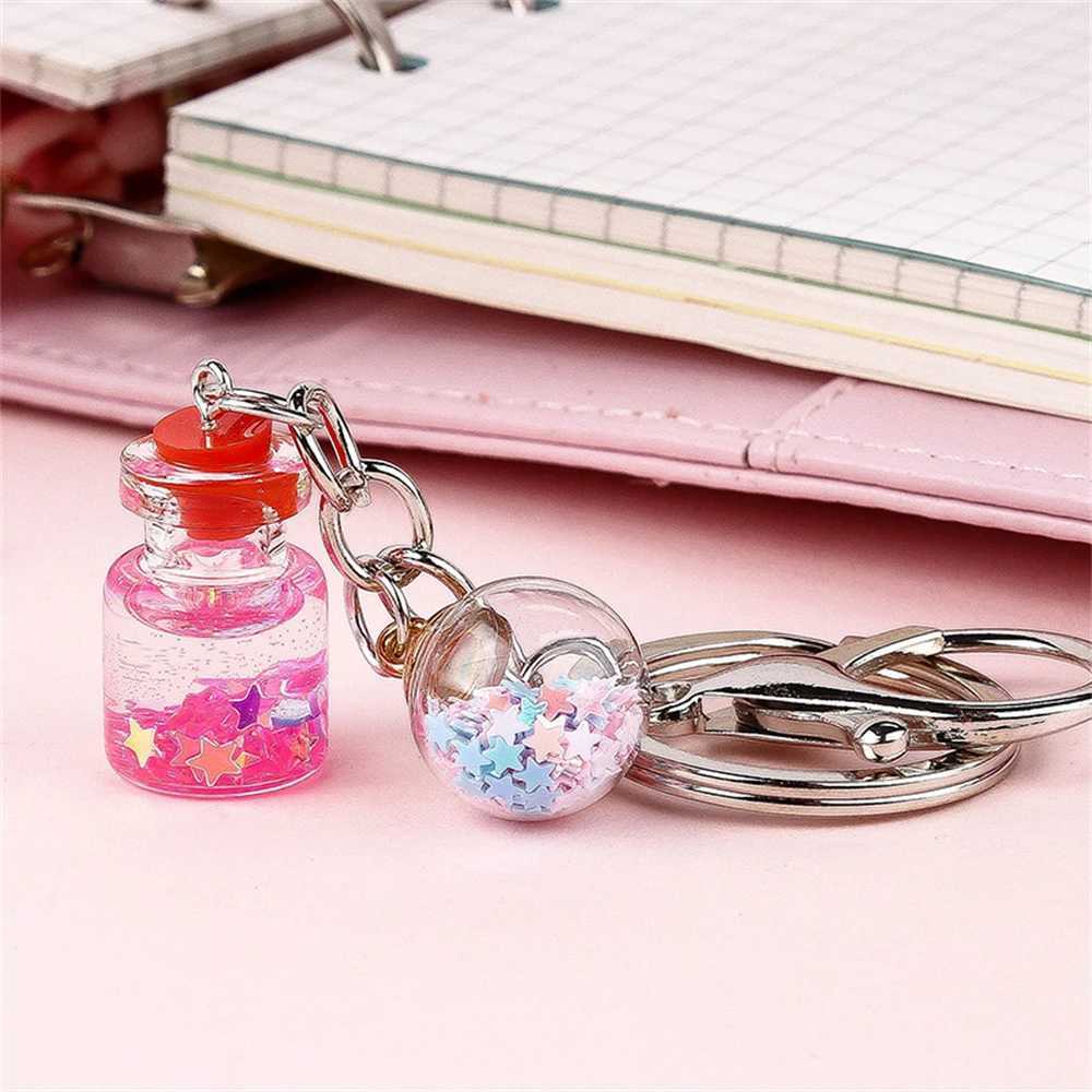 Keychains Lanyards Creative Quicksand Bottle Keychain Student Cute Simulation Flower Bottle Pendant Key Rings For Girls Fashion Party Gift