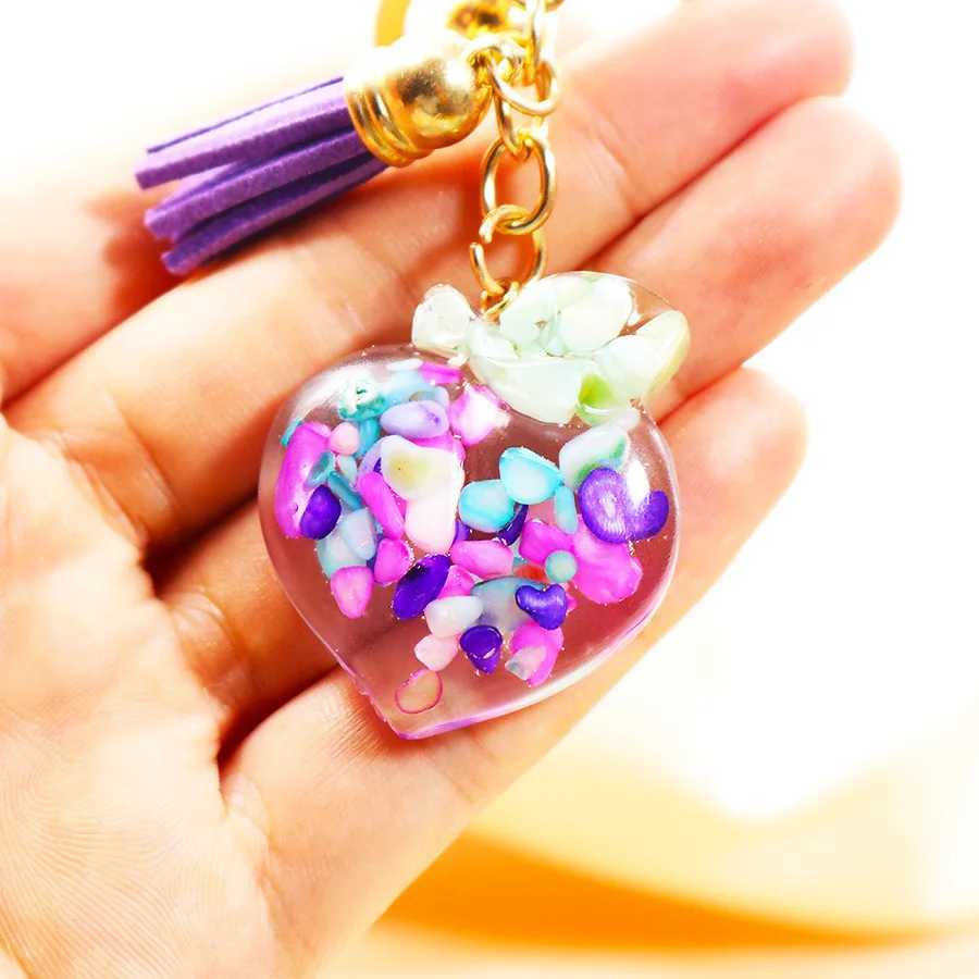 Chaços de chaveiros novos pêssego de pêssego de pêssego e epóxi charme de fruta acessórios de chaves femininos pendentes de tassel bens bolsas de presente para celular chaveiro de telefone para celular