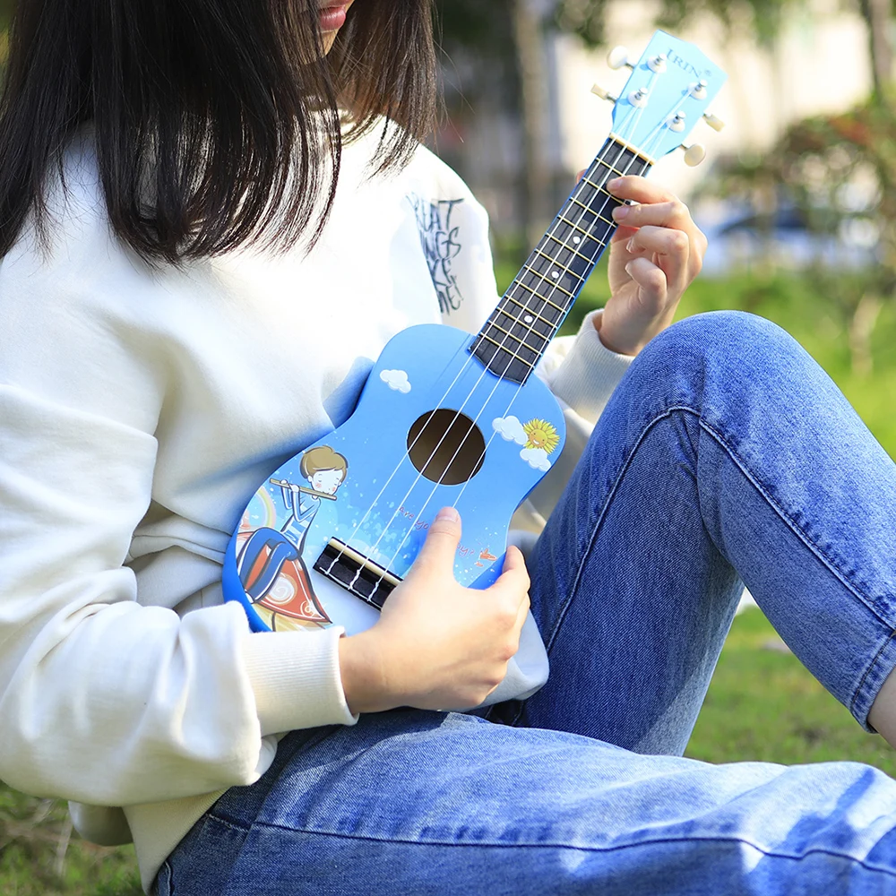 Câbles irin 21 pouces ukulélé basswood 4 cordes instrument de musique guitare hawaïen rose prince bleu prince pour les enfants débutants cadeau