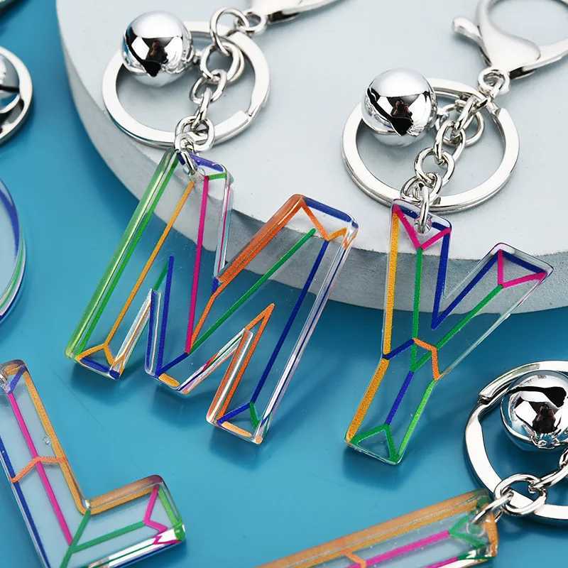 Keychains LETTERES LETTRE PENDANT Keillettes Résine Chaînes clés Anneaux pour femmes Migne ACRYLIC GLITTER COURT DU PORTE