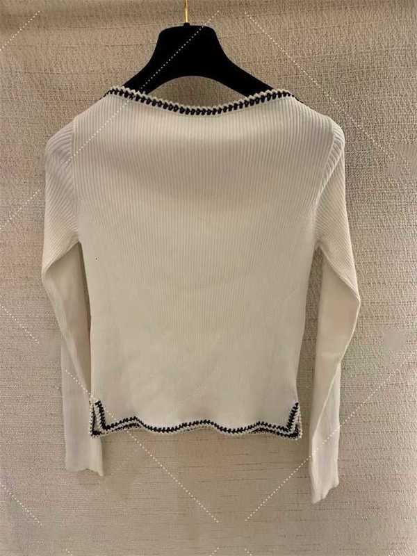 Kobiety Damskie Krzyki Projektantka Xiaoxiang Black and White Knited Top na wiosnę 23 NOWOŚĆ SLIM FIT Simple Długie rękawie IGO6