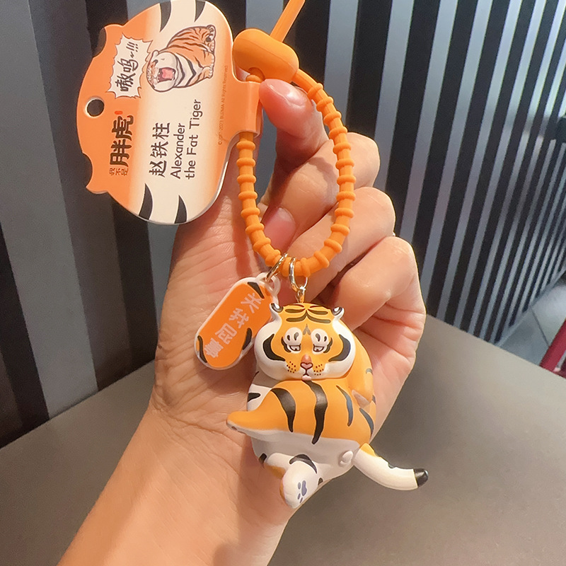 Cartoon genuine version, I am not a cute and delicate Fatty Tiger keychain for men and women. Fatty Tiger figurine keychain, circle, backpack, pendant