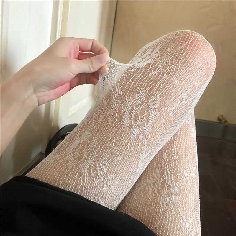 Sexiga strumpor hål ut mesh spetsar fisknät strumpor strumpbyxor lolita japansk stil kvinnliga tights fisk nylon blommor tryck sexiga kvinnor strumpbyxor 240416