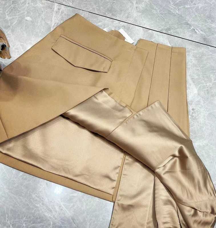 Skirts designer Nanyou Zhi 2024 Early Spring New Fashionable Irregular Pleated Half Skirt Classic Slimming Metal Belt Short ON4U