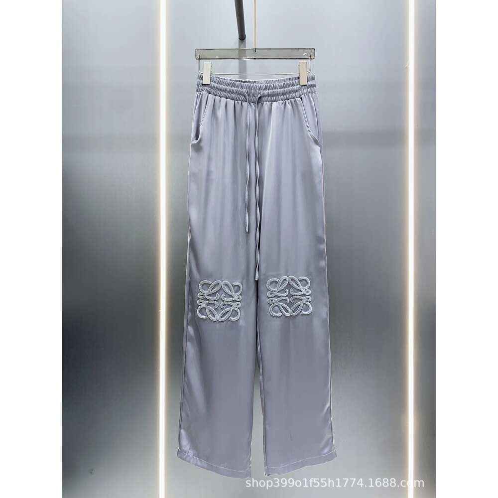 Designer SS24 printemps / été nouveau créneau de créneau de conception du tempérament de serviette en peluche pantalon décontracté polyvalent