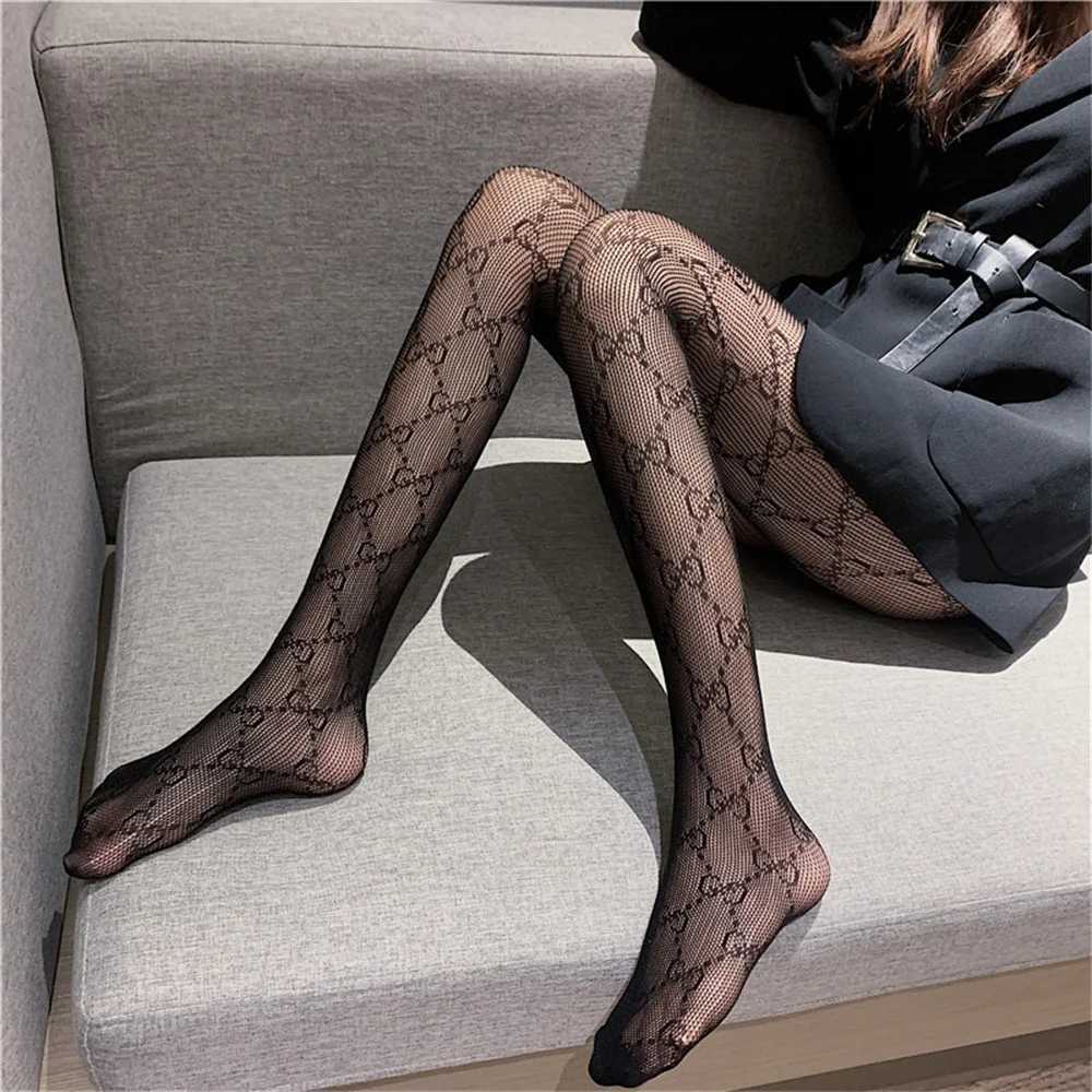 Chaussettes sexy femmes Black Fishnet Pantyhose Legging Stockings Sexy Mesh Japanese Girl Lolita Ins Collages Stocking High Waist Lace High Choches 240416