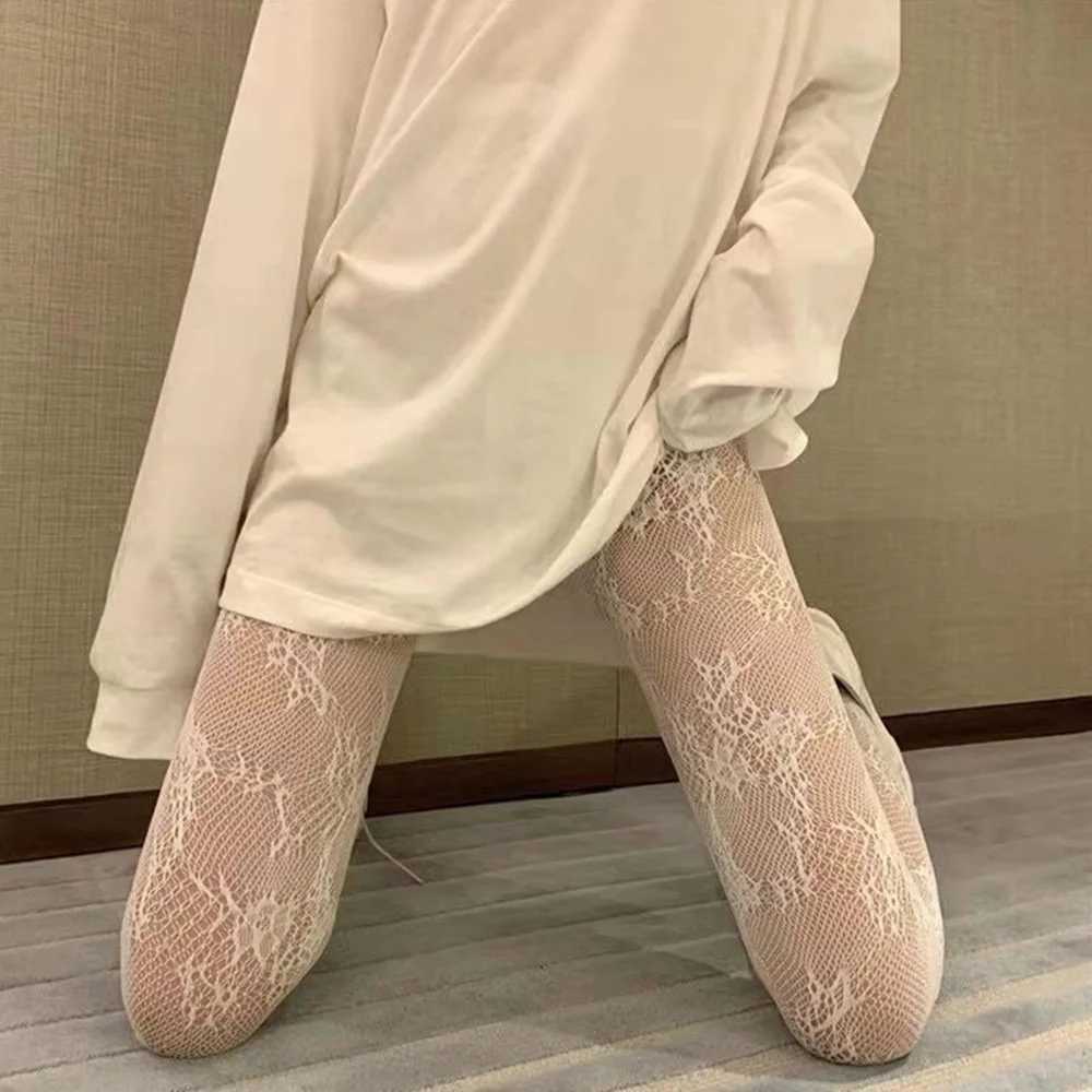 Chaussettes sexy femmes Black Fishnet Pantyhose Legging Stockings Sexy Mesh Japanese Girl Lolita Ins Collages Stocking High Waist Lace High Choches 240416