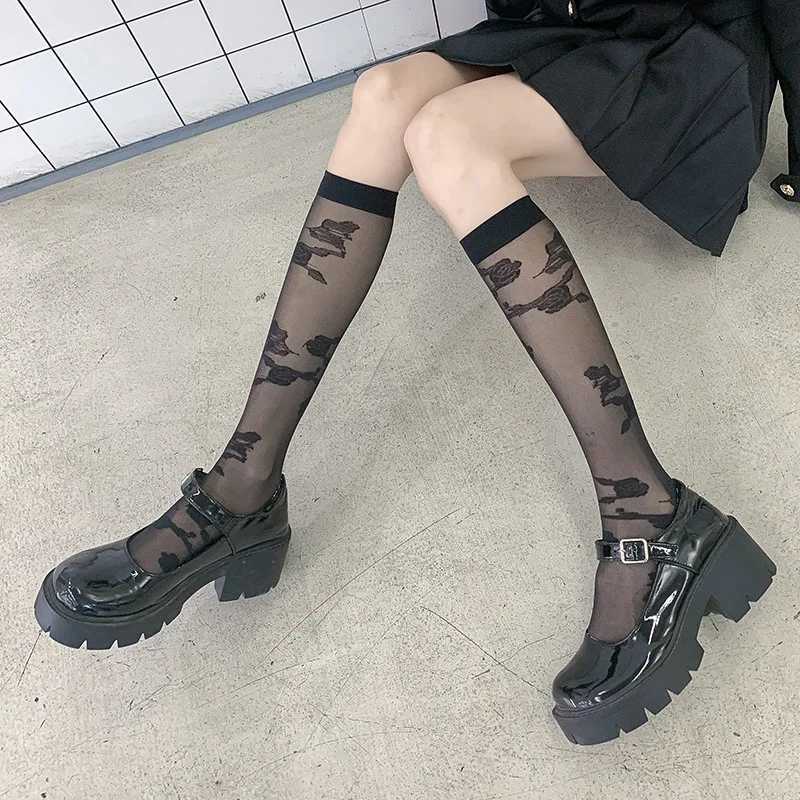 Chaussettes sexy femmes lolita bas d'été nylon mince chaussette longue noire sur les cuisses de cuisses de cuisse haut nylon soft nylon fishnet jk bassages 240416