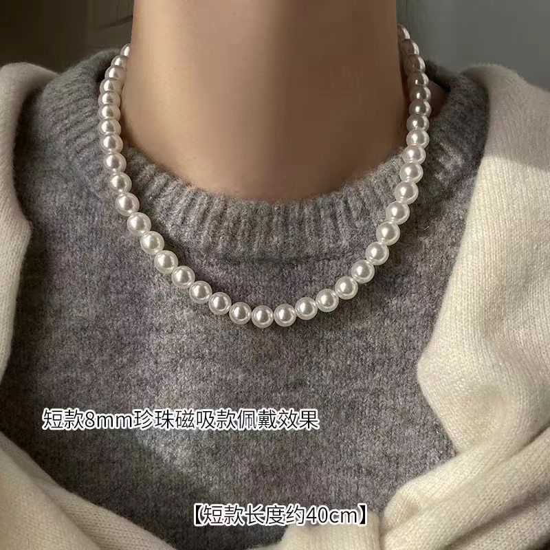 Shi jiaao biała magnetyczna klamra okrągła perel naszyjnik dla kobiet 2024 Nowy warstwowy łańcuch swetra Light Luksusowy łańcuch szyi w stylu