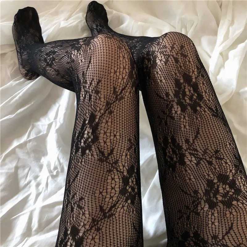 Sexiga strumpor hål ut mesh spetsar fisknät strumpor strumpbyxor lolita japansk stil kvinnliga tights fisk nylon blommor tryck sexiga kvinnor strumpbyxor 240416