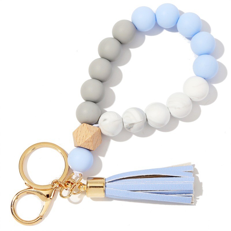 2024 New food grade silicone bead bracelet Wooden bead bracelet key chain PU fringe anti-loss key ring bracelet