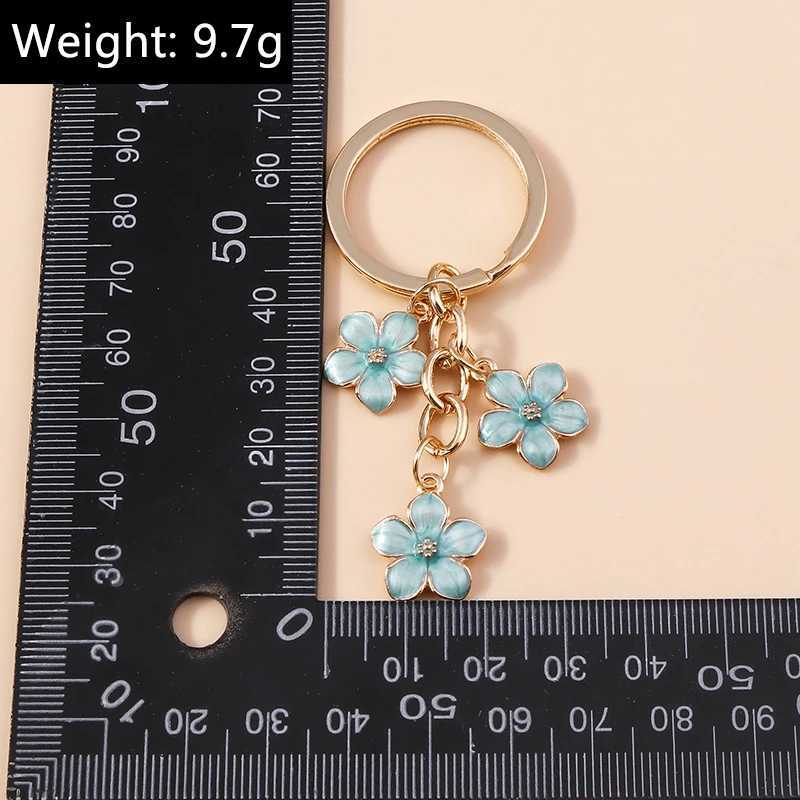 Keychains Lanyards Cute Enamel Keychain Colorful Sakura Flower Key Ring Sweet Key Chains for Women Girls Handbag Accessories DIY Jewelry Gifts d240417