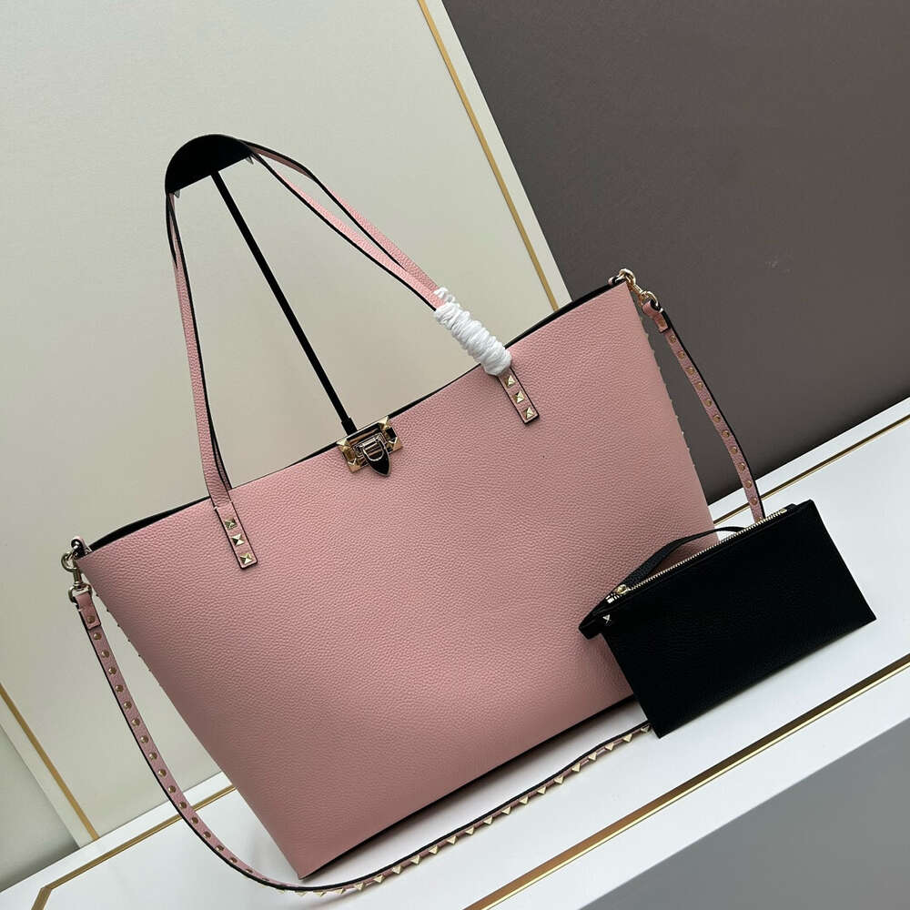 Handheld valenen dames grote lederen dekschouder schoudercapaciteit handtassen zakken nieuwe klinknagel bakken tas vo crossbody 2024 designer trendy vrouw rock l4ol