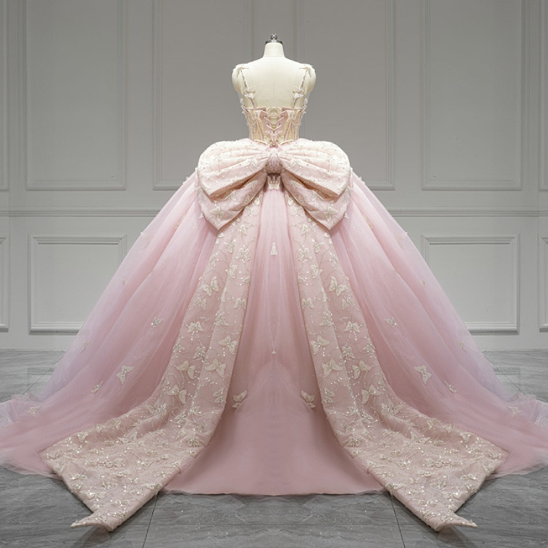 豪華なピンクの光沢のあるプリンセス・キンセアネラ・ドレススパゲッティ・ストラップビーズ弓・タルパーティードレス