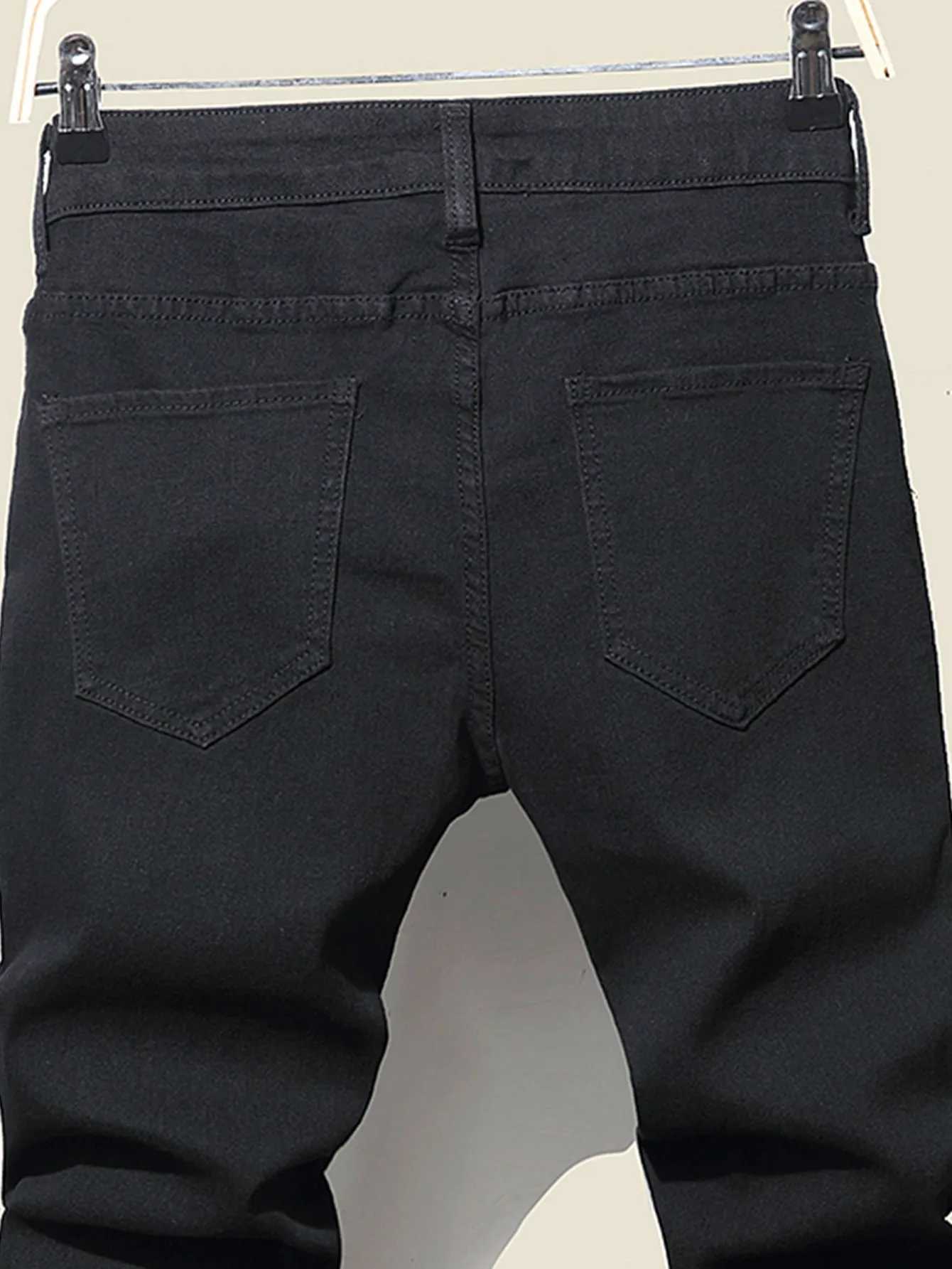 Jeans masculin, hommes, hommes plissés de streetwear plissés, trous de streetwear raboté patchwork en détresse pantalon denim mince pantalon skinny d240417