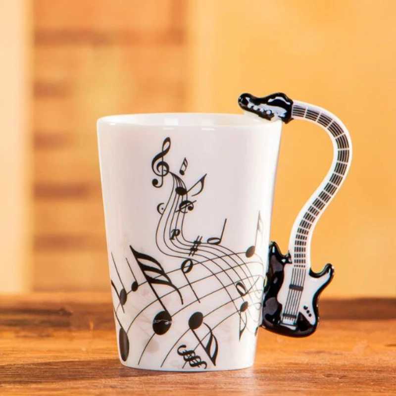 Muggar 240 ml Creative Music Ceramic Mug Guitar Violin Style Söt kaffete Mjölk Stave Mugs and Cups With Tombe Novely Gifts 240417