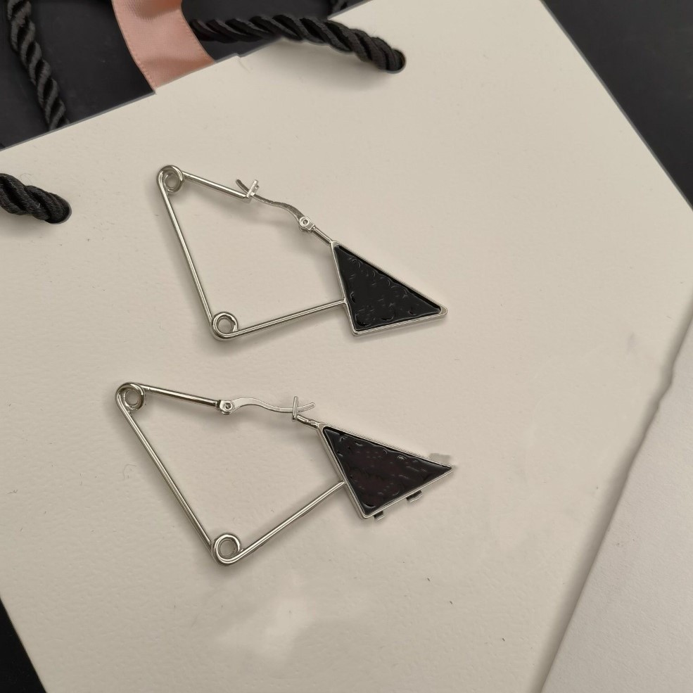 Lettres triangulaires européennes et américaines pende les boucles d'oreilles en couple de lustre de haute qualité et livraison rapide153a