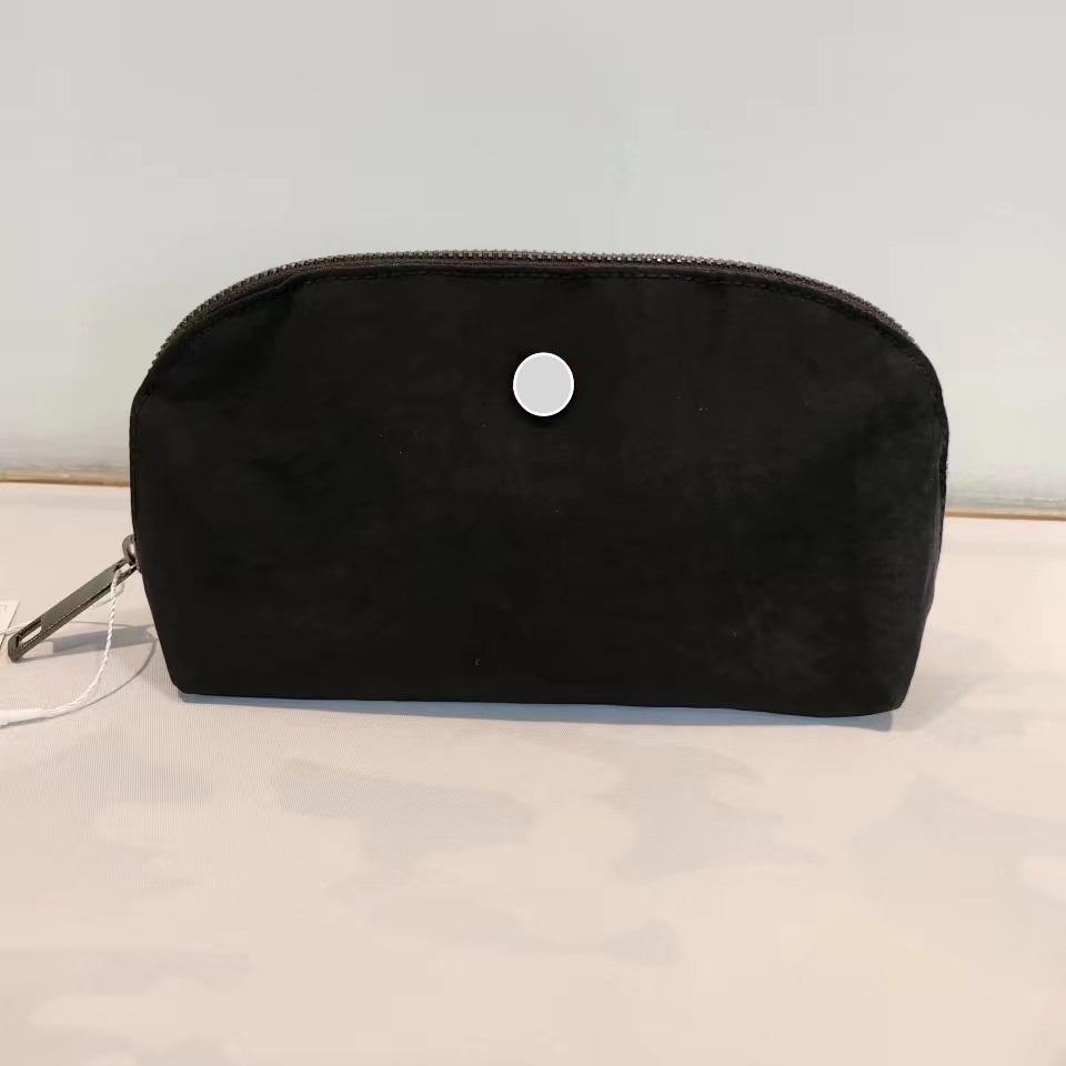 Ll sac cosmétique portable forme de coque portable de voyage de voyage sac à main