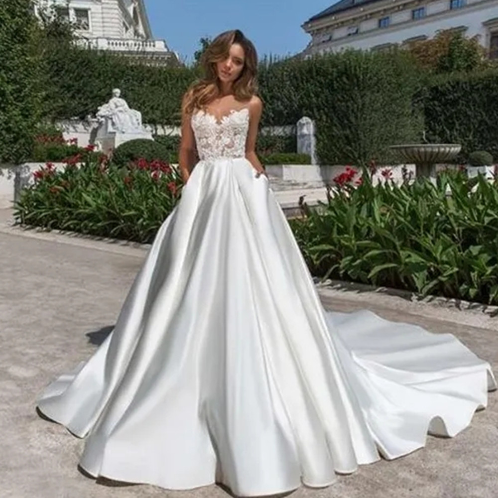 Modern Satin A Line Wedding Dresses For Brides With Pockets Sheer Crew Neck Lace Appliqued Plus Size Simple Bridal Gowns Sweep Train Backless Robes de Mariee CL1669