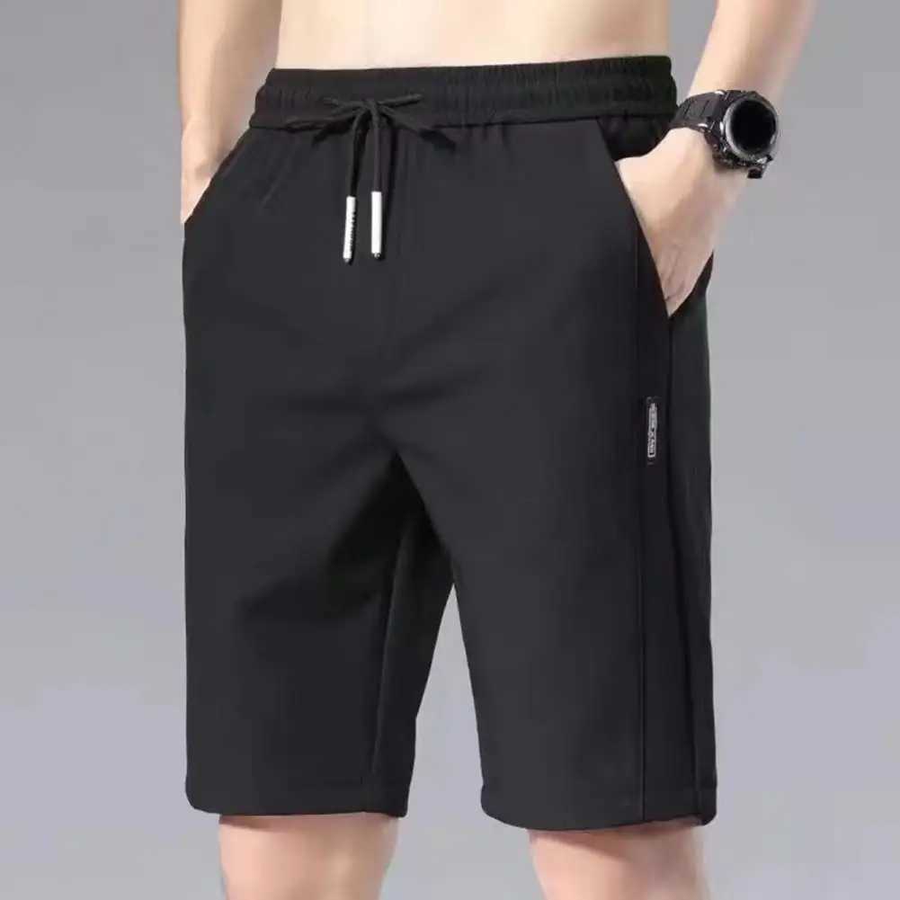 Mäns shorts 2022 Summer Mens Sports Shorts Solid Color Straight Mönster Löst typ Elastisk midja Drawstring Casual Shorts Jogging Pants 240419 240419