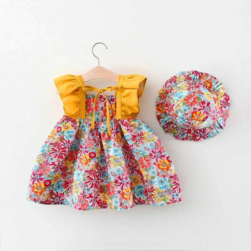 Sukienki dla dziewczyn Summer New Girl Pasp Sukienka Fragmentowana kwiat dziecięcy Suknia Księżniczka Sukienka 0-3-letnia noworodek ma kapelusz D240423