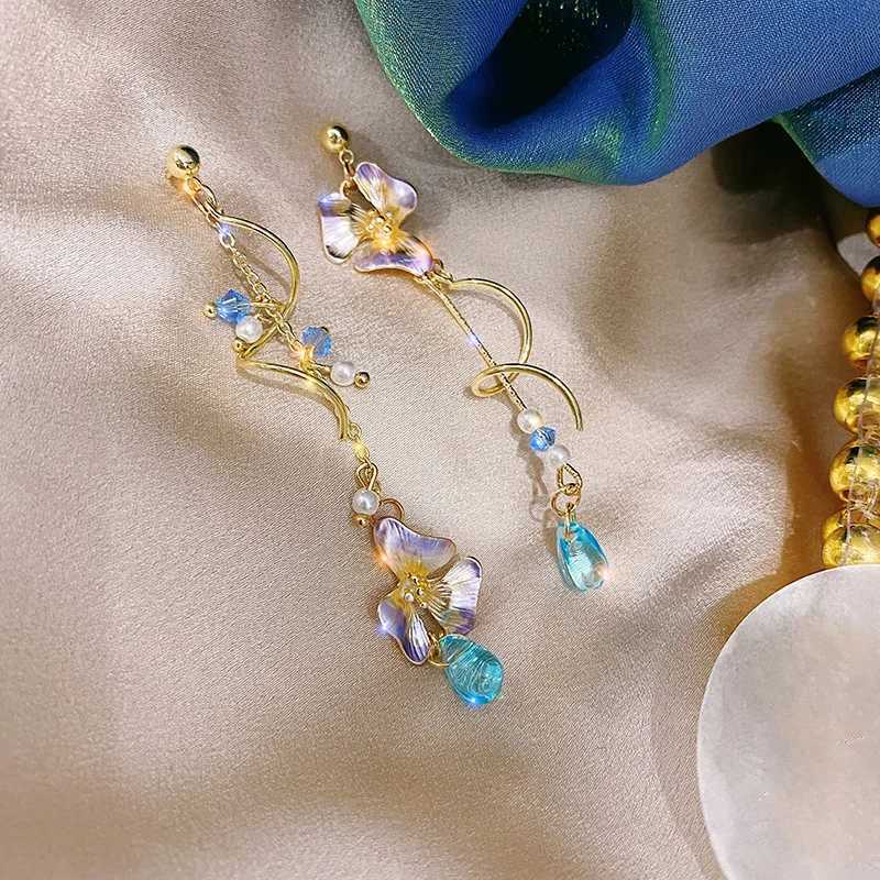 Autres nouvelles boucles d'oreilles en spirale asymétrique mignonnes mignonnes à la mode