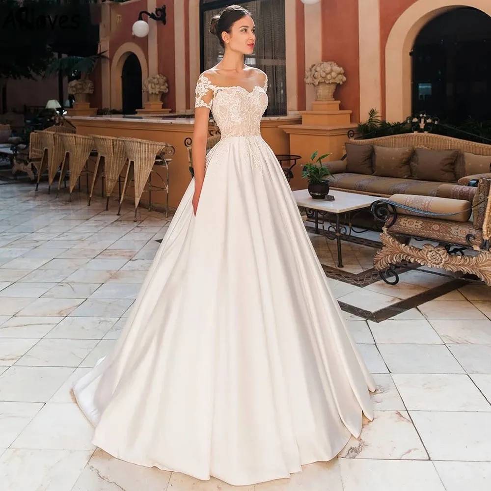 Eleganckie satynowe sukienki ślubne z krótkim rękawem koronkowe aplikacje nowoczesne boho ślubne suknie ślubne zamiatać pociąg sher decidos de novia yd