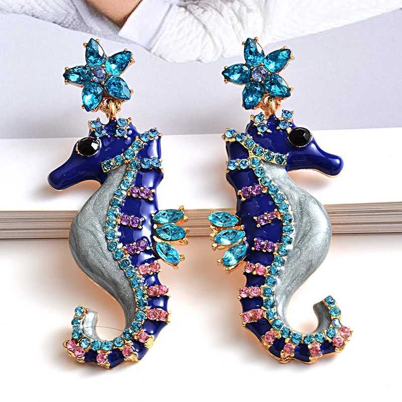 Altri nuovi design Orecchini a forma di cavalcata lunghi a forma di cavalcatura di alta qualità Cristalli oliati di alta qualità Cancellazione di gioielli di moda le orecchie donne 240419