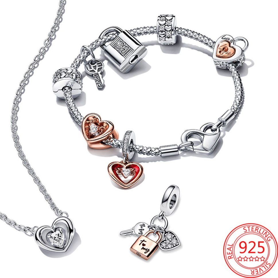 Der neue beliebte S925 Sterling Silber Two Color Key Sliding Heart Suspension Charm ist für Pandora Armband Halskette Halskette geeignet