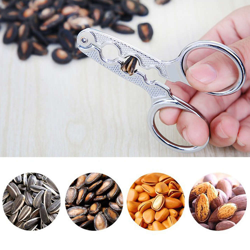 NOVO 1-SHELLER NUTS MELON PLIER PISTACHIO PISTACHIO SUOWER SEEDS PEELER WALNUT COZINHA COTHOLE TOLA LIGADO DE SEMENTE DE SEMENTE