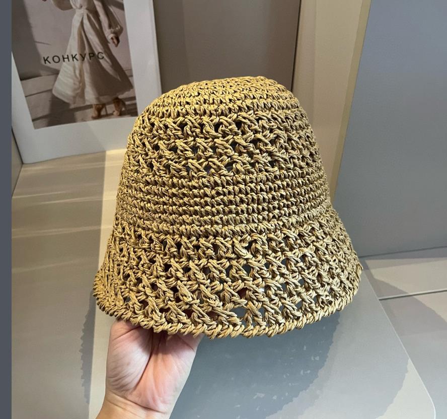 Crochet de luxe Chatte de seau Femmes Designer Summer plage mm broderie de paille de paille du soleil mobile caps de soleil bouchons de crâne de crâne dames tricots haletants chapeau pêcheur