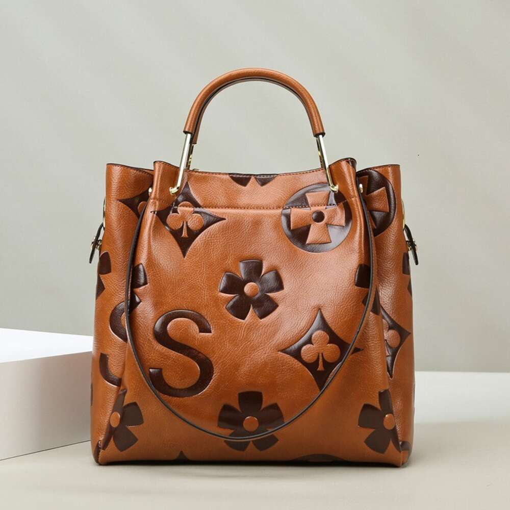 Luxury Brand Handbag Couro Artigos femininos verão nova textura da moda em relevo