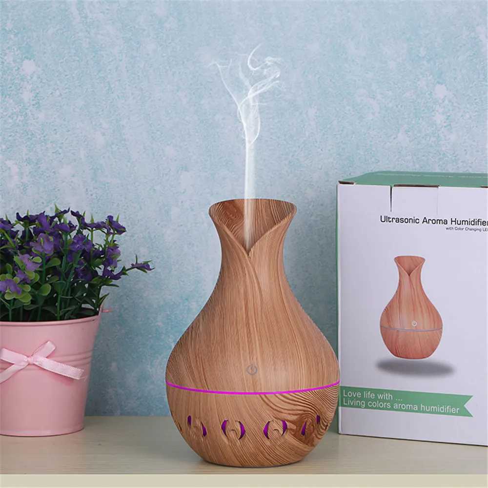 Luftfuktare 130 ml ny vas luftfuktare ihålig träkorn aromatisk olje diffusor 7-färg LED-ljus lämplig för kontor y240422