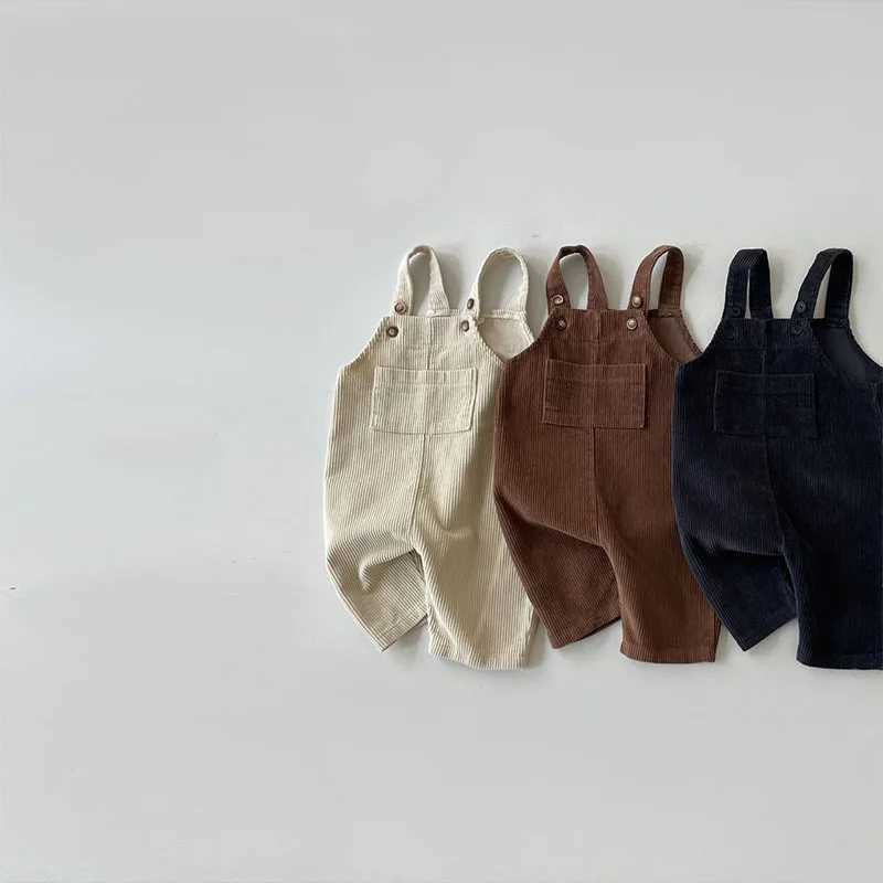 Jumpsuits 2023 Ny baby ärmlös corduroy overaller solid nyfödda bomull romper barn casual rem jumpsuit höst spädbarn kläder h240423