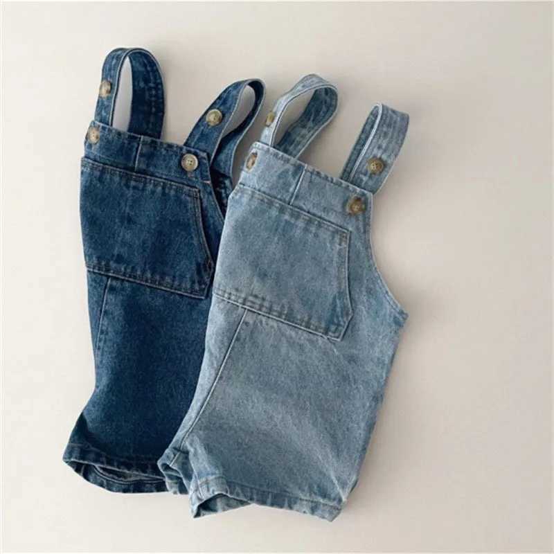 Jumpsuits 2023 Leer nieuwe baby mouwloze denim bodysuit schattige baby overalls peuter boy soft jumpsuit katoenen kleding H240423