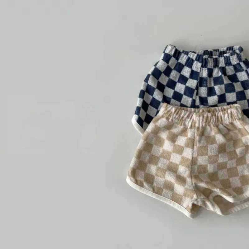 Shorts 2023 sommar ny baby pläd bomulls andning barn casual mode flickor randiga byxor bekväma pojke h240423