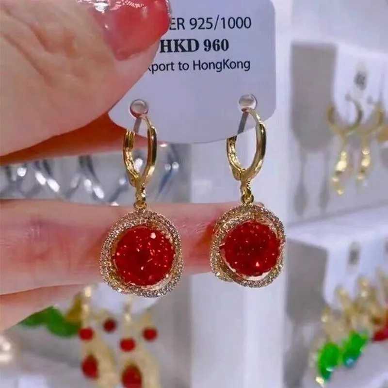 Bengelen kroonluchter luxueuze rode Red Rhinestone Ball unieke ontwerp oorbellen voor vrouwen mode gepersonaliseerde accessoires nieuwjaars cadeau partij sieraden d240323