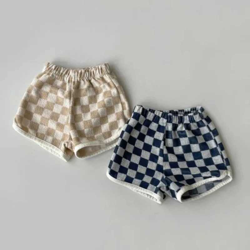 Shorts 2023 sommar ny baby pläd bomulls andning barn casual mode flickor randiga byxor bekväma pojke h240423