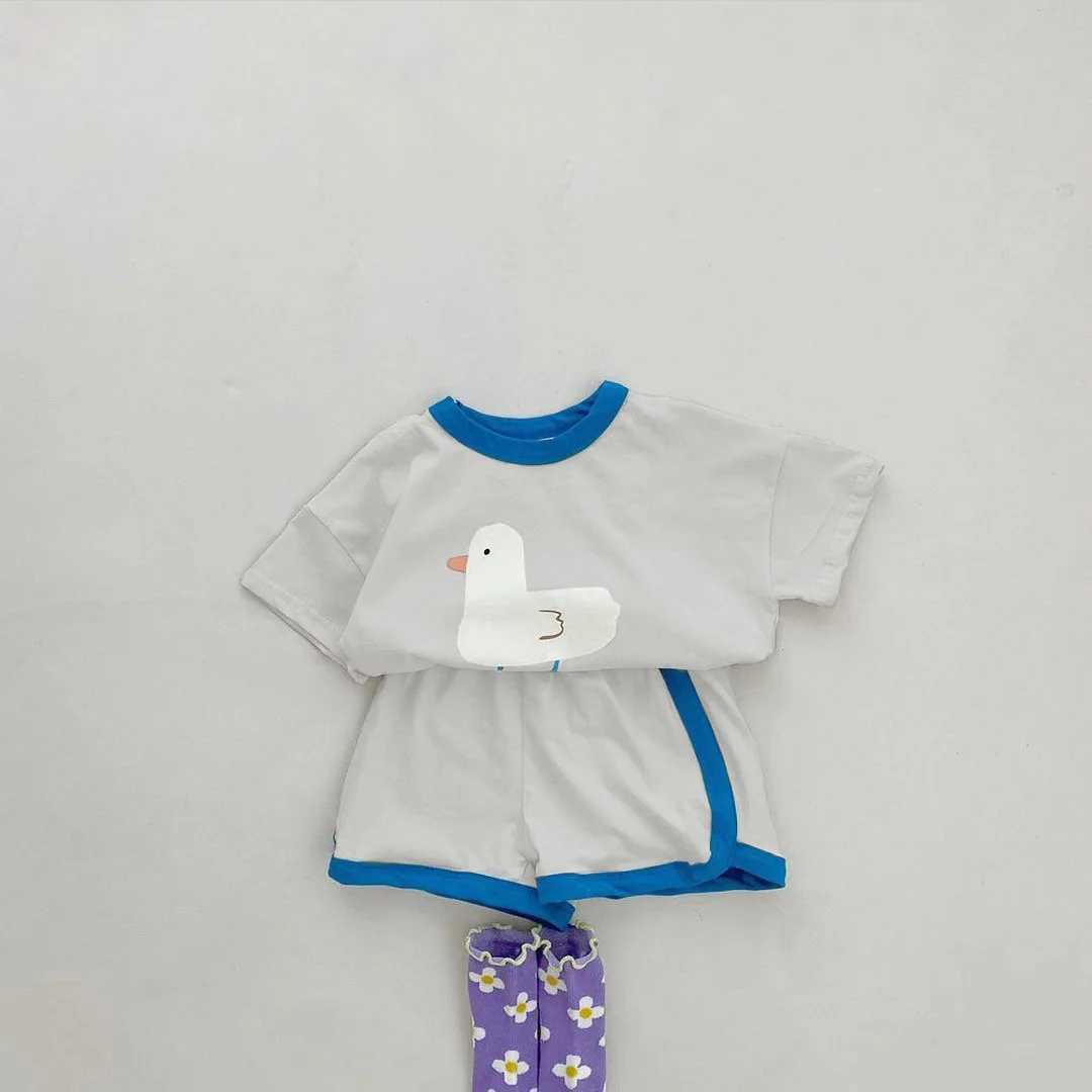 Ensembles de vêtements 2023 Été Nouveau bébé à manches courtes Sentes de vêtements pour nourrissons mignons T-shirts de canard mignon + short costume enfants