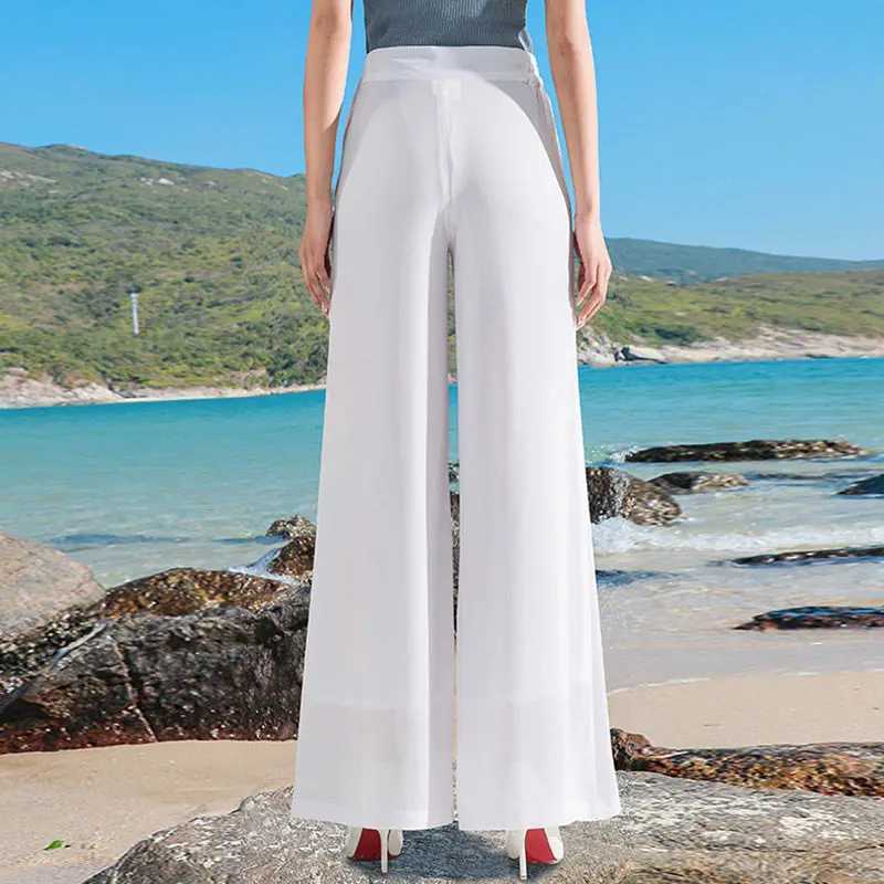 Damskie dżinsy damskie odzież 2023 Casual Button Solid Kolor Pockets Wysoka talia Eleganckie luźne suwakowe sprężyste lato proste szerokie spodnie Y240422