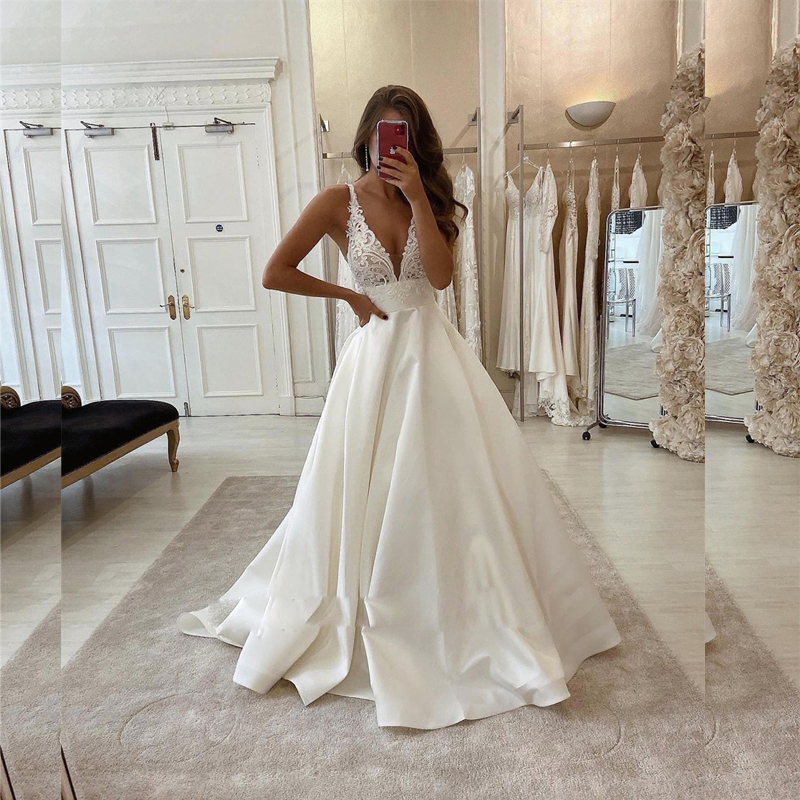 Nuevo hermoso satén de encaje Mira a través del vestido de novia Sexy Vestidos de boda de cuello en v Correo