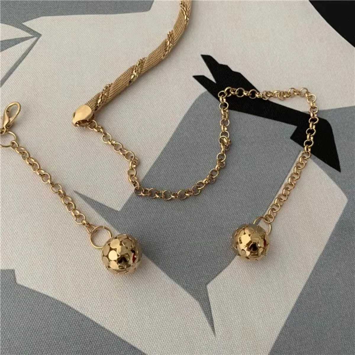 Waist Chain Belts A metal waist chain for women with hollowed out scales wrapped around waist belt small ball pendant tassel dress skirt belt