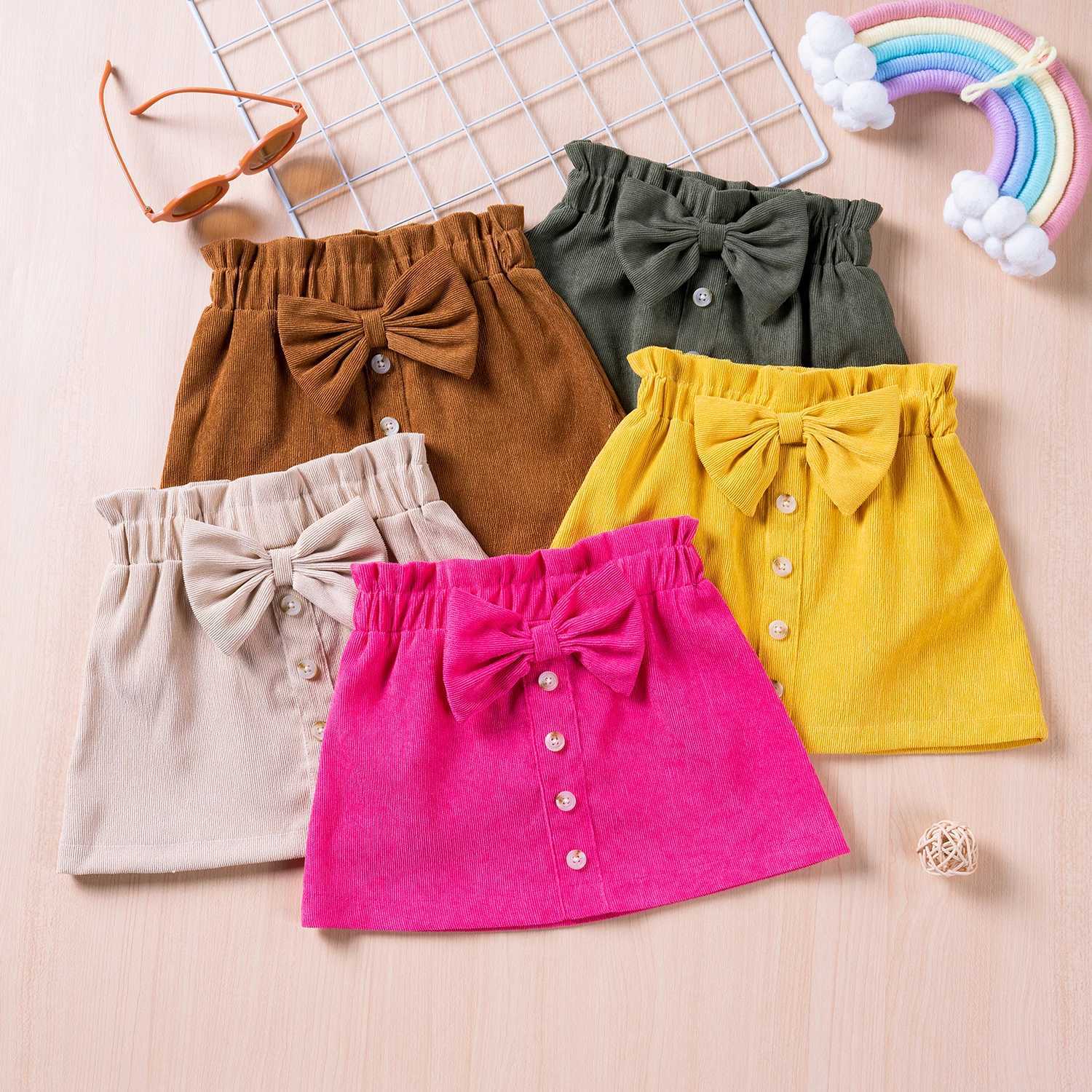 Saias 1-5y crianças criança meninas meninas fofas botões de arco A-line Autumn Spring Clothing Costumes H240423