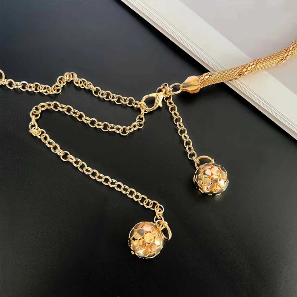 Waist Chain Belts A metal waist chain for women with hollowed out scales wrapped around waist belt small ball pendant tassel dress skirt belt