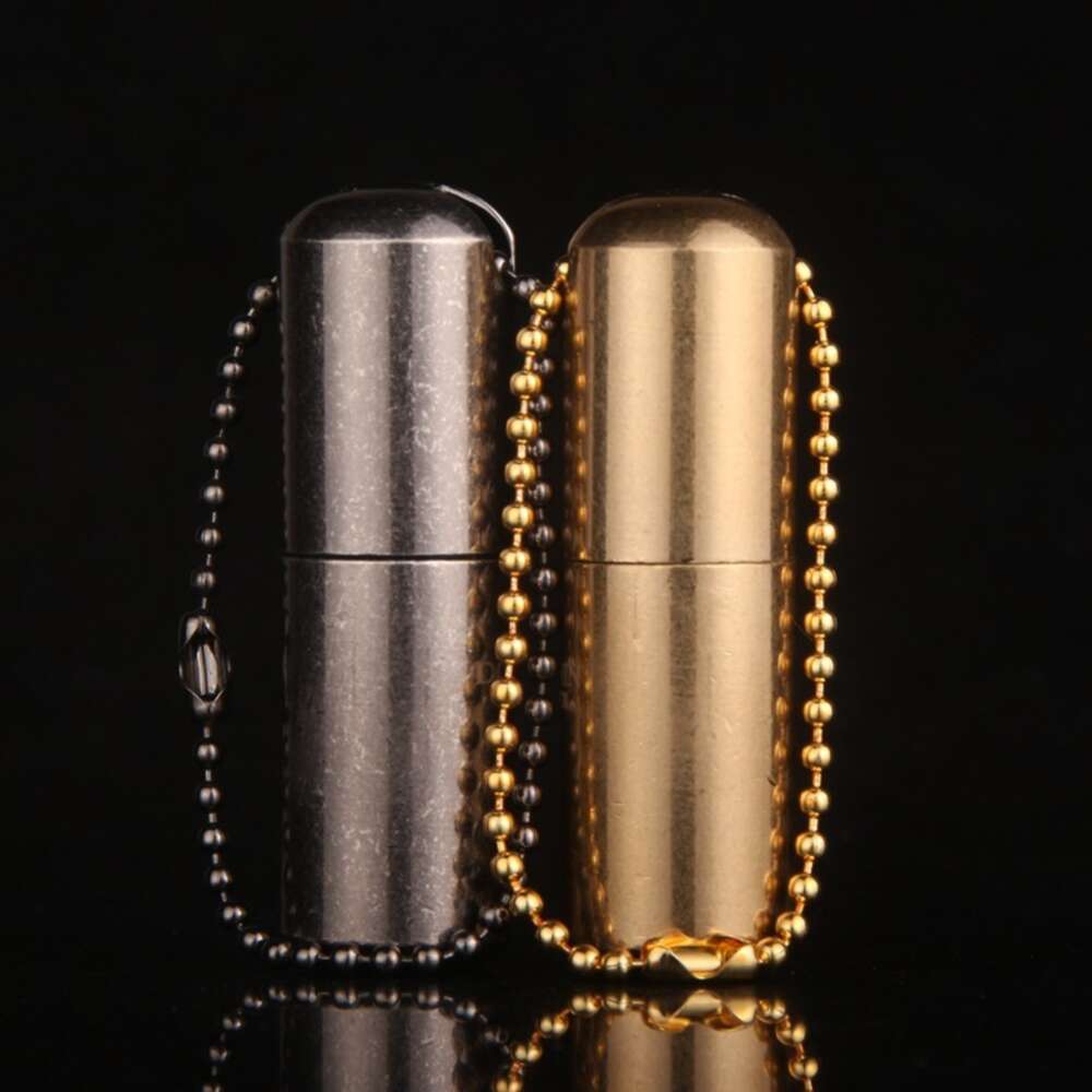 Mini -zak zonder benzine lichtere sleutelhanger capsule compacte kerosine lichtere buitengereedschap iated sleutelhanger slijpen wiel lichter