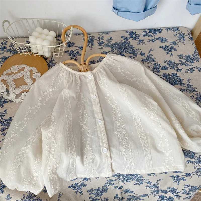 Chemises pour enfants 2024 Spring Nouvelles filles Couleur solide broderie bébé fille en coton o-cou chouches enfants haut de gamme H240423